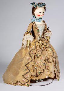 Wooden and carved doll in an 18th century costume