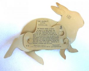 Raphael Tuck Makers mark on back of articulated rabbit paper doll