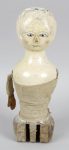 An early 19th century carved wooden and gesso doll